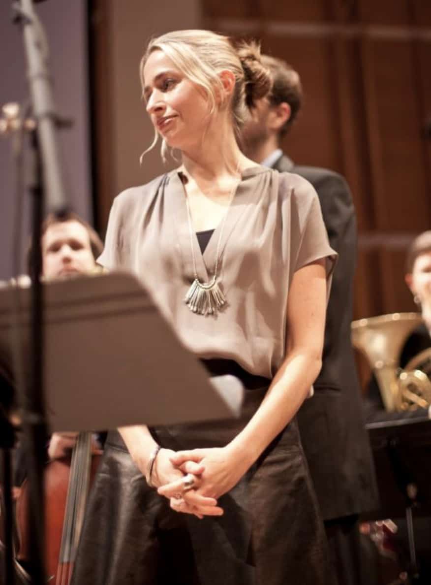 Sarah Kirkland Snider, known around the world for her music, stands surrounded by an orchestra about to perform. Press photo courtesy of the artist.