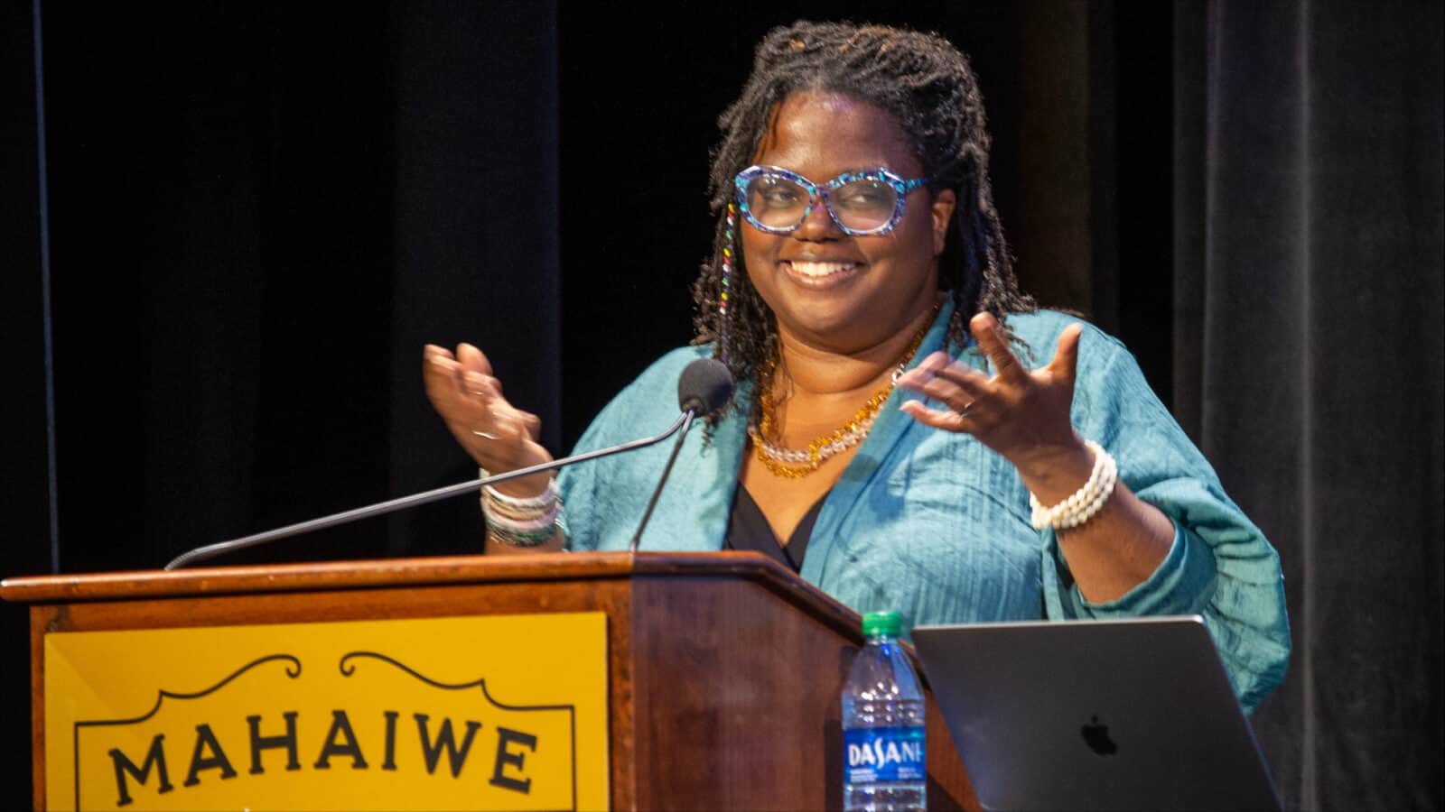 Gwendolyn Van Sant, Founder and CEO of Bridge, welcomes the gathering at the Pay Equity Project's presentation in June 2023 at the Mahaiwe Performing Arts Center. Press photo courtesy of WAM and the Mahaiwe