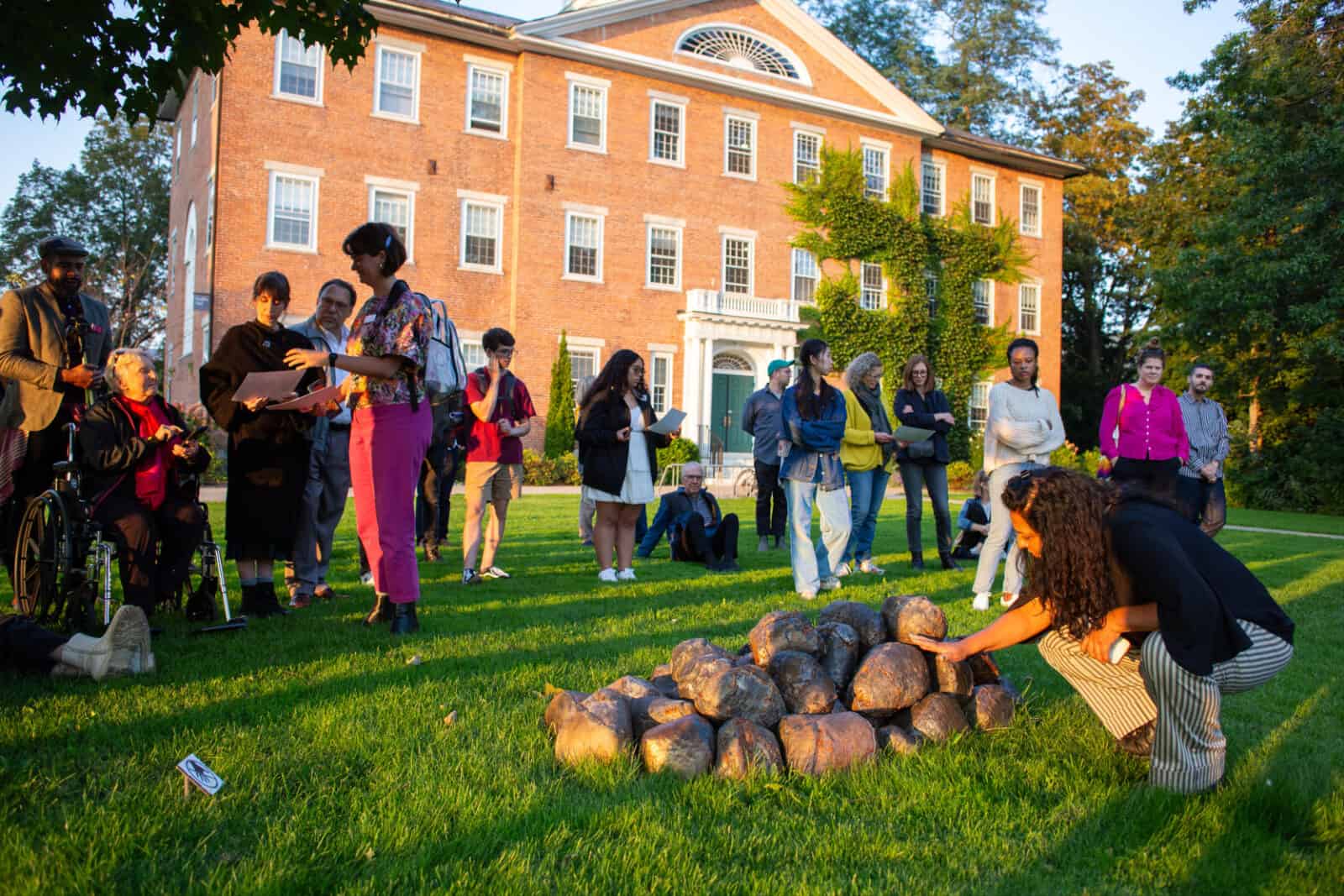 A group of students and visitors join artist Beatriz Cortez to talk about her work in Portals at Williams College. Press photo courtesy of Wiliams College