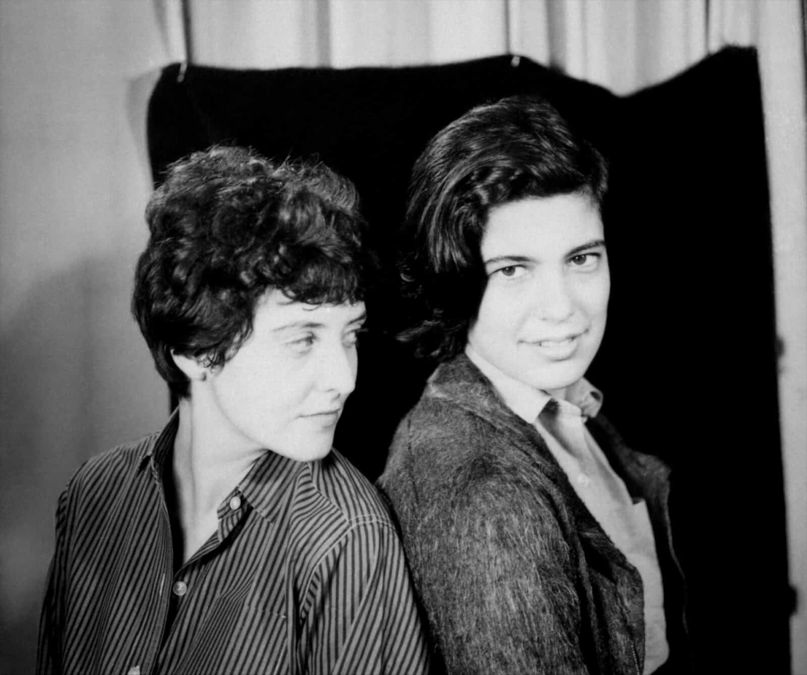 Acclaimed playwright Maria Irene Fornés and writer Susan Sontag sit together in New York City in a black and white photograph from the 1960s. Photo courtesy of Robert Steed and The Rest I Make Up