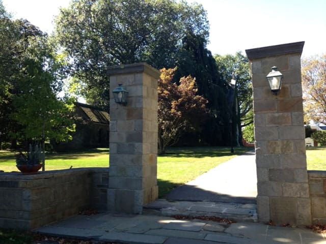 The gates to the estate that now houses now the Pomfret School show the scale of houses on Pomfret Street.