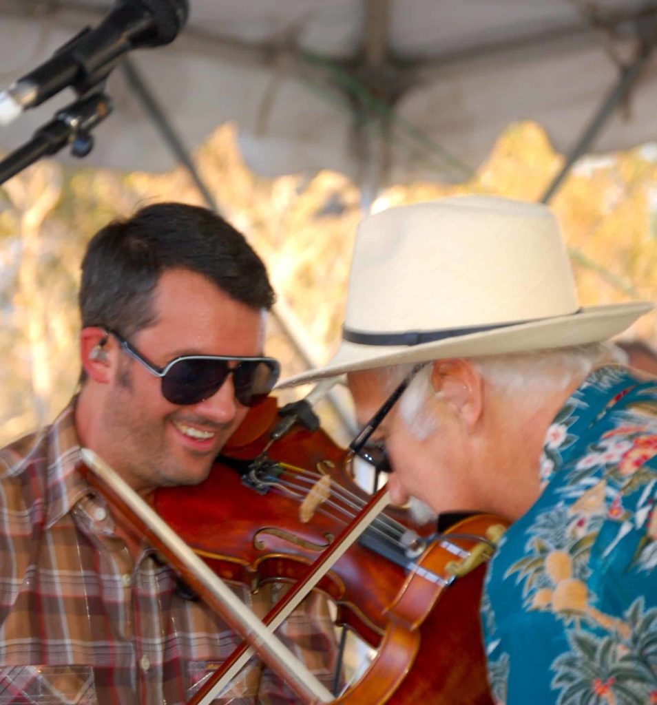 Fiddlers from Beausoleil play a duet. Creative Commons courtesy photo