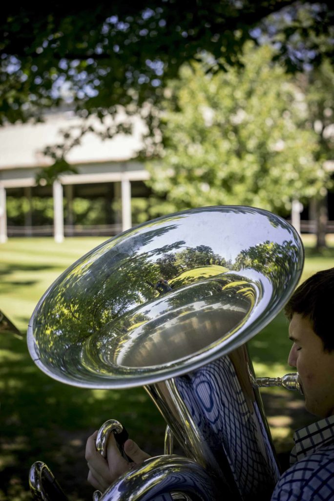 A Tanglewood Music Center tuba Fellow rehearses on a sunny day. Photo by Marco Borggreve, courtesy of Tanglewood