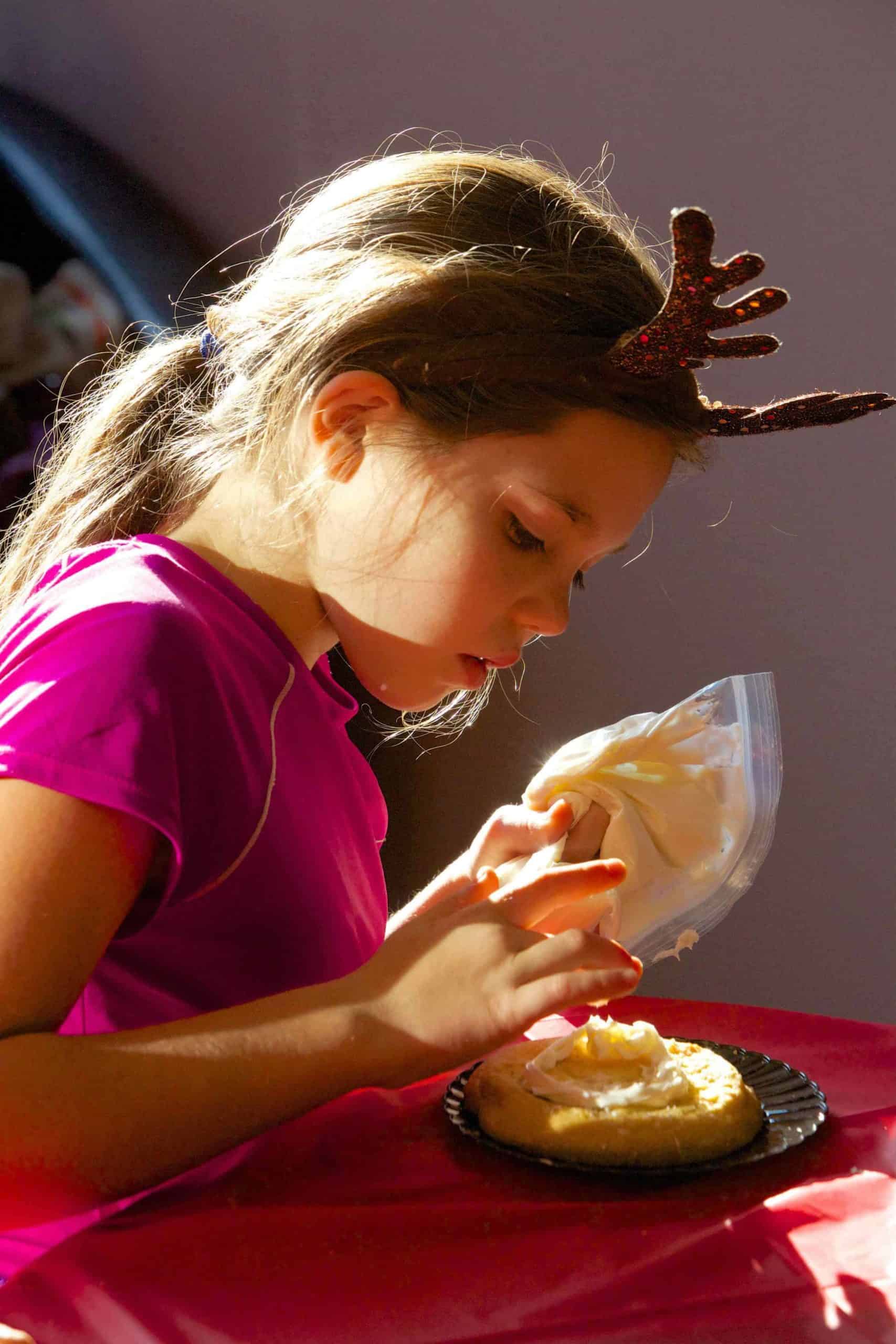 Decorating cookies at the Williamstown Holiday Walk. Photo courtesy of the Williamstown Chamber of Commerce