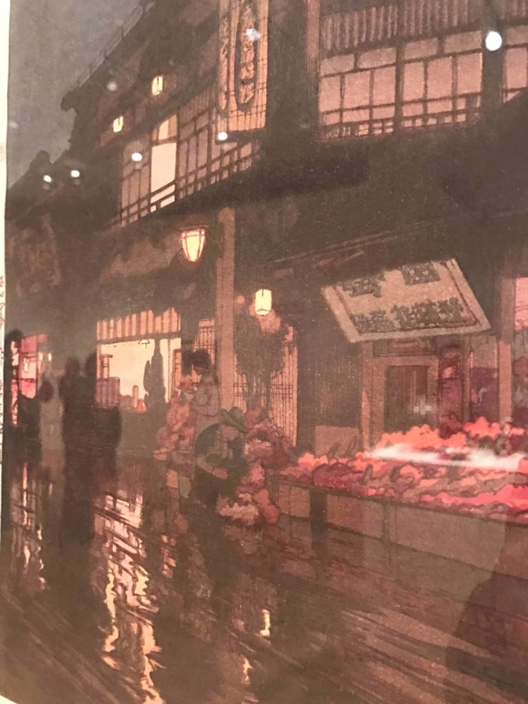Yoshida Hiroshi's Kagurazaka Street gleams on a wet night in an ukiyo-e woodblock print in Japanese Impressions at the Clark Art Institute.
