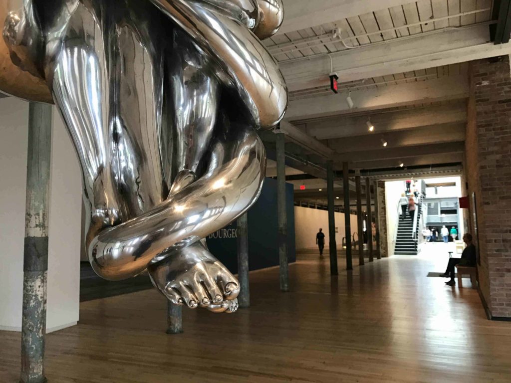 Silvery feet entwine at Mass MoCA's Building 6 in North Adams.