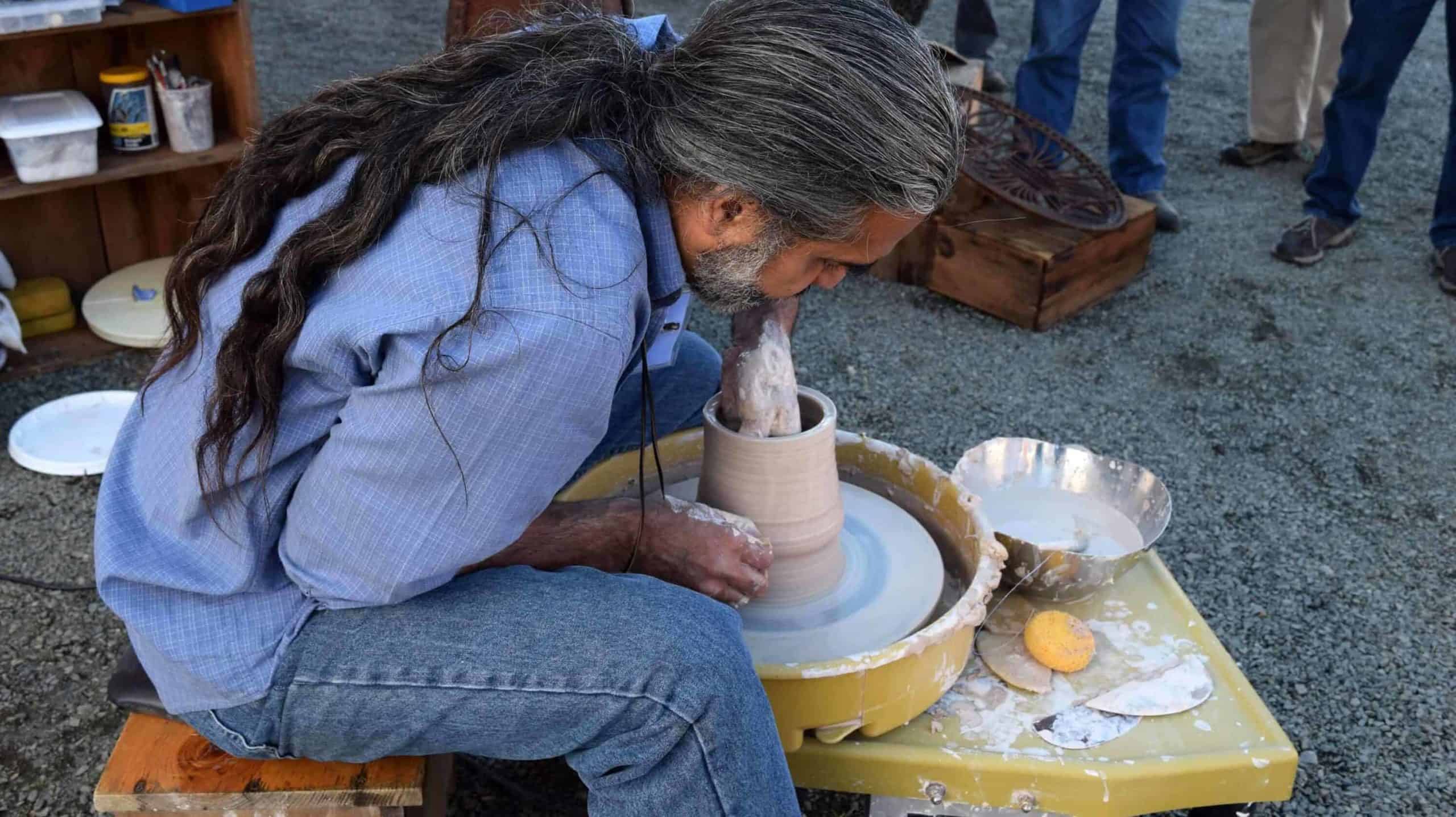 Vicente Garcia demonstrates on the potter's wheel at Paradise City Arts Festival. A ceramist and college professor, Garcia is also a sculptor of large-scale metal structures. He will share the secrets of his studio every day at the Festival. Photo courtesy of Paradise City Arts Festival in Northampton