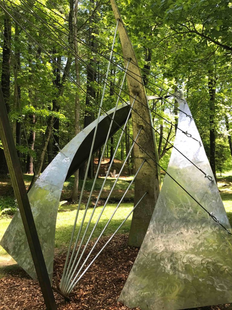 Anabasis by Chris Plaisted gleams near the main house in SculptureNow's 2017 show at The Mount.