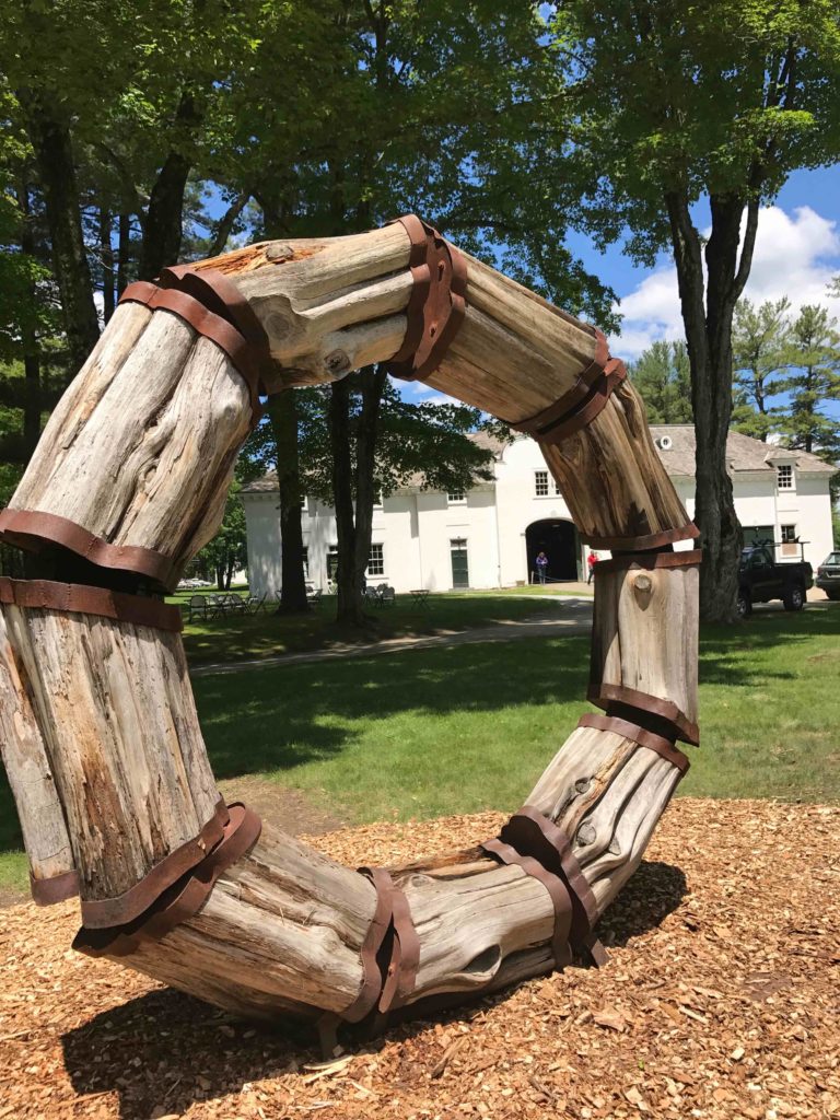 James M. Burnes' Nine Piece Ring joins massive wooden links in in SculptureNow's 2017 show at The Mount. Photo by Kate Abbott