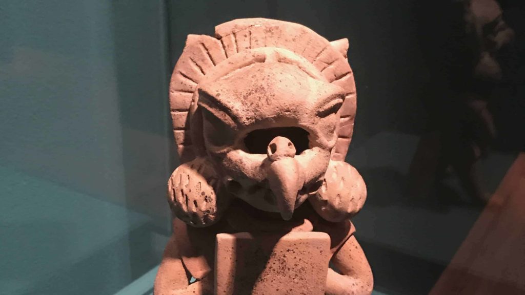 This bird-headed warrior from central Veracruz is a ceramic whistle from 150 to 400 CE. Soldiers may have played whistles like these on the way to battle. On loan from Yale University Art Gallery.