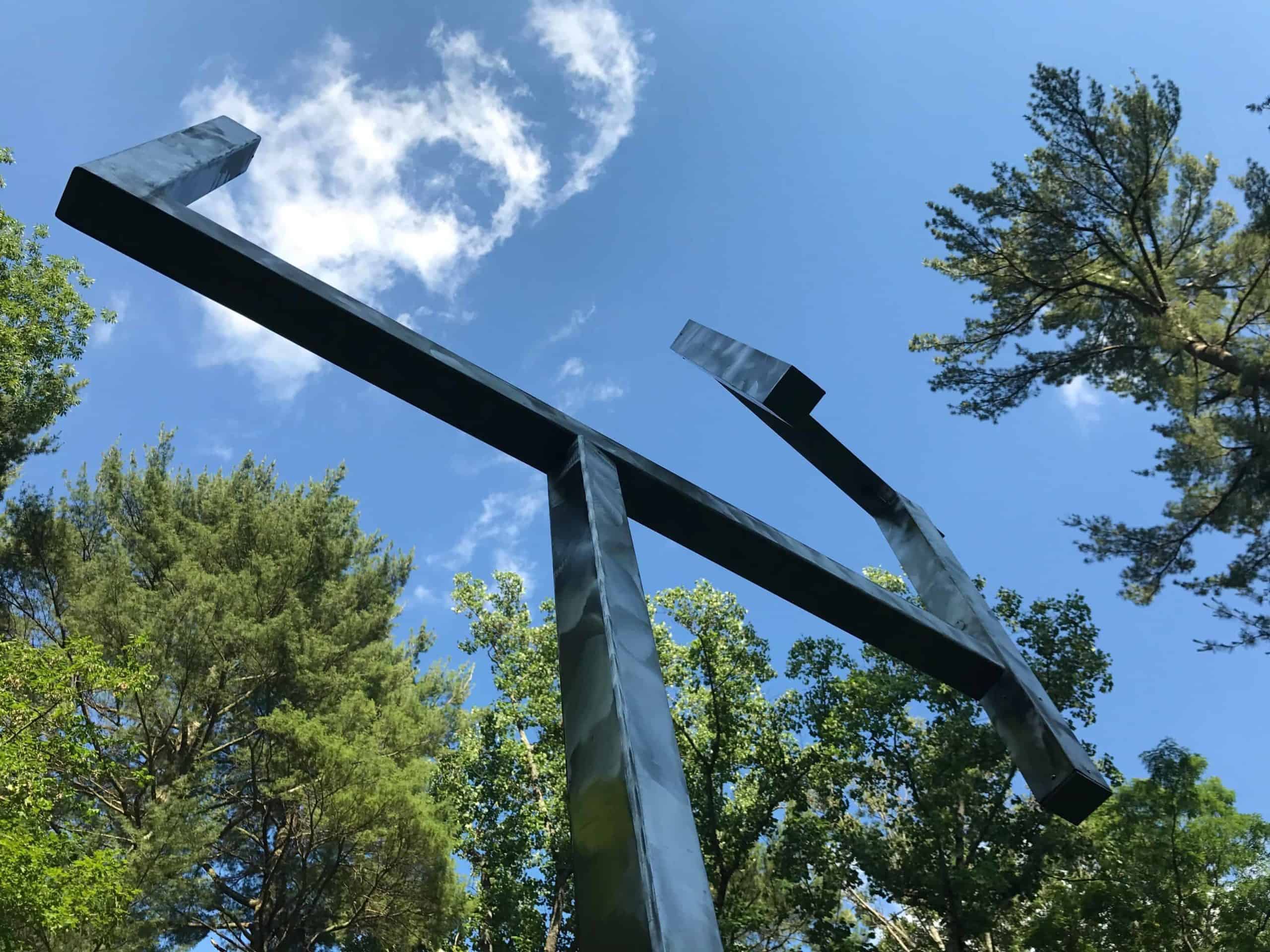 A George Rickey kinetic sculpture with goal-loke posts turns gentlyin the annual contemporary show at Chesterwood in Stockbridge, in summer 2018.