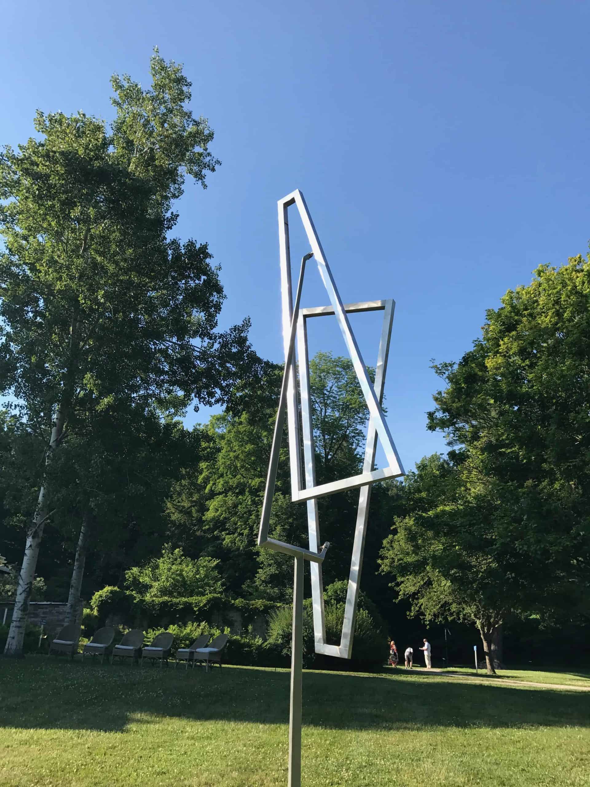An angular George Rickey kinetic sculpture revolves at Chesterwood in Stockbridge, in summer 2018.