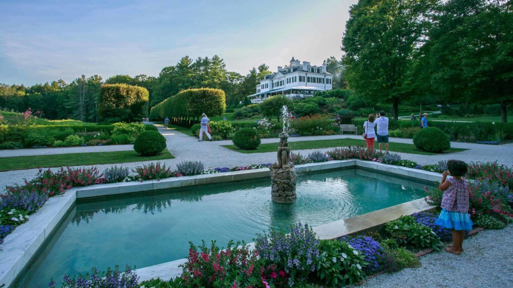 Summer visitors walk through the gardens at The Mount, writer and novelist Edith Wharton's home in Lenox, in the Berkshires.