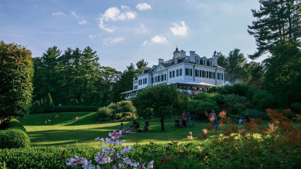 Families picnic on the lawn at the Mount, Edith Wharton's house in Lenox.