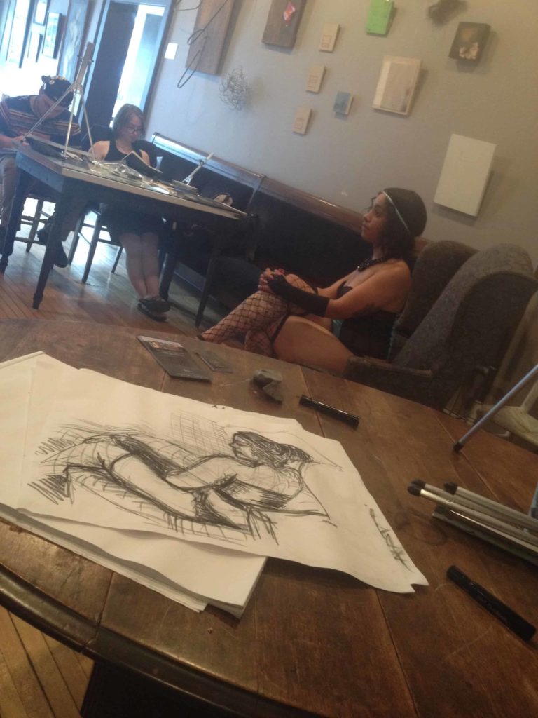 Local artists gather for a drawing workshop at Dottie's Coffee Lounge.