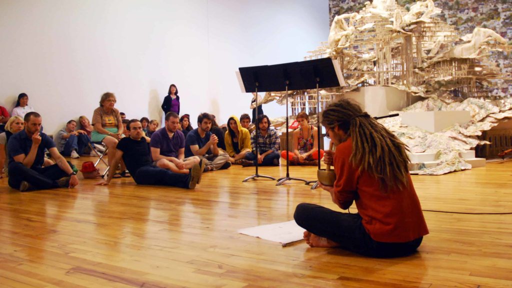 A Bang on a Can musician performs in the galleries at Mass MoCA in North Adams.
