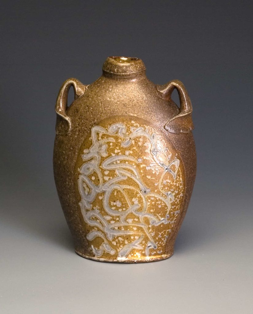 An oval bottle by ceramics artist Mark Shapiro.