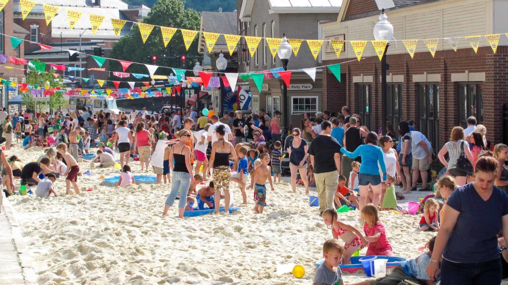 North Adams hosts the annual Eagle Street beach party downtown.