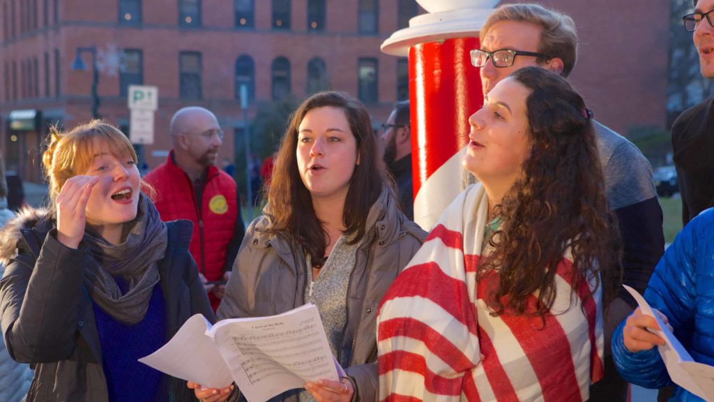 Carolers sing near sunset at the annual Williamstown Holiday Walk. Photo courtesy of the Williamstown Chamber of Commerce