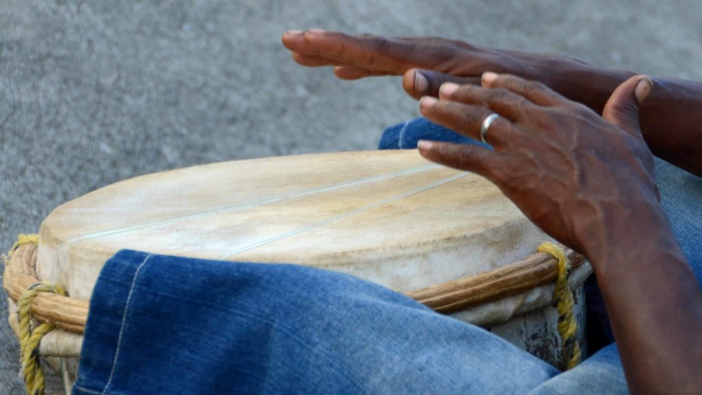 A drummer keeps the rhythm in his hands. Creative Commons courtesy photo.