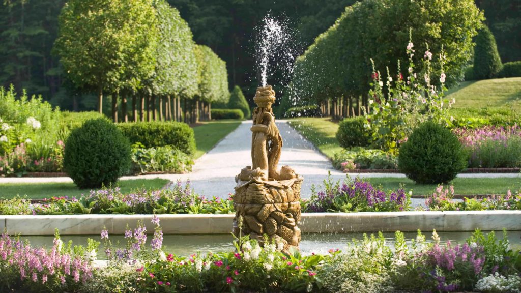 The dolphin fountain plays in the gardens at The Mount, Edith Wharton's historic house in Lenox.