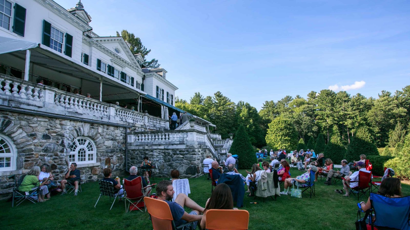 Families gather to listen to Music After Hours at the Mount, Edith Wharton's historic house in Lenox.
