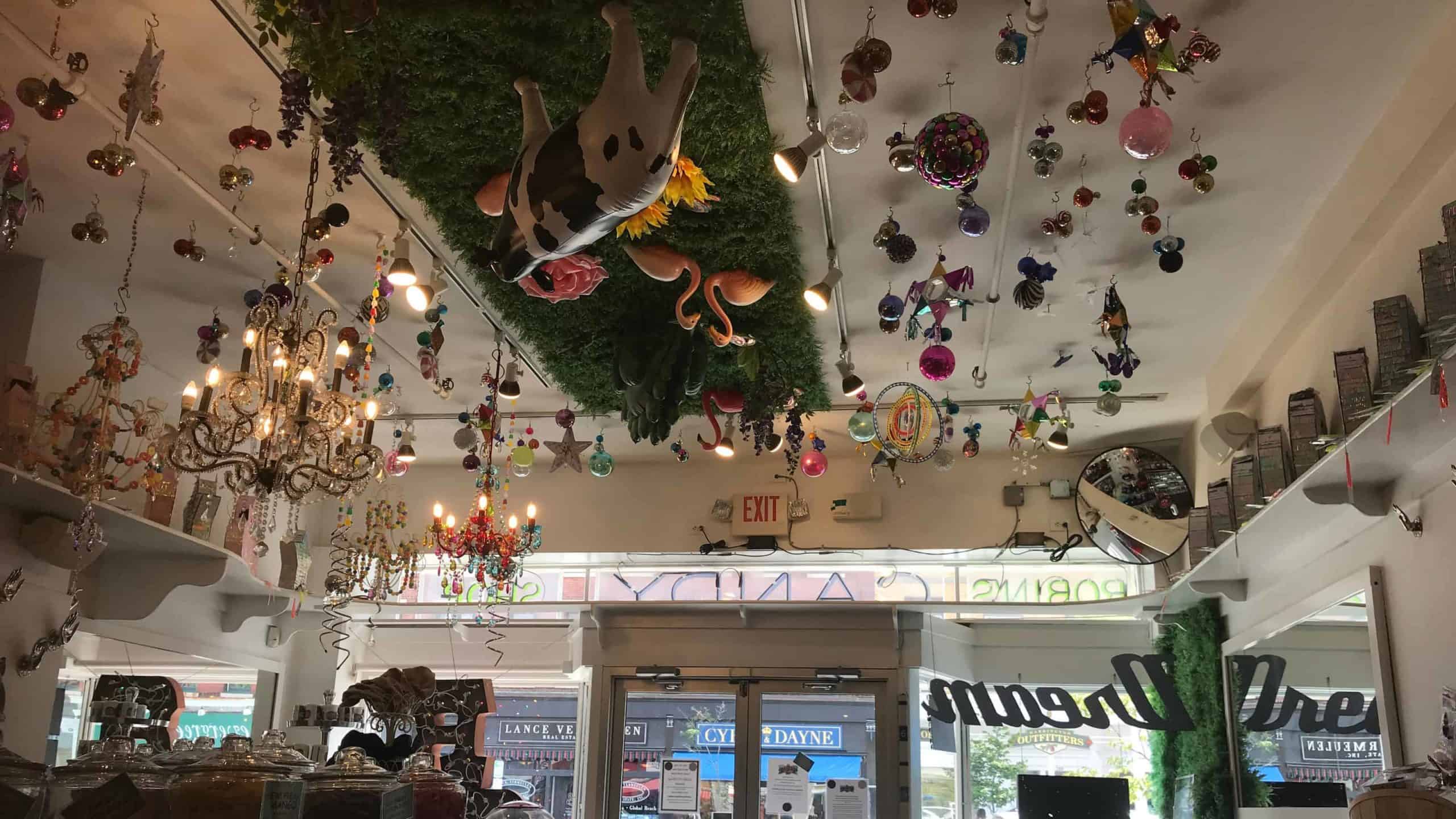 The ceiling shows a world turned upside down at Robin's Candy in Great Barrington.