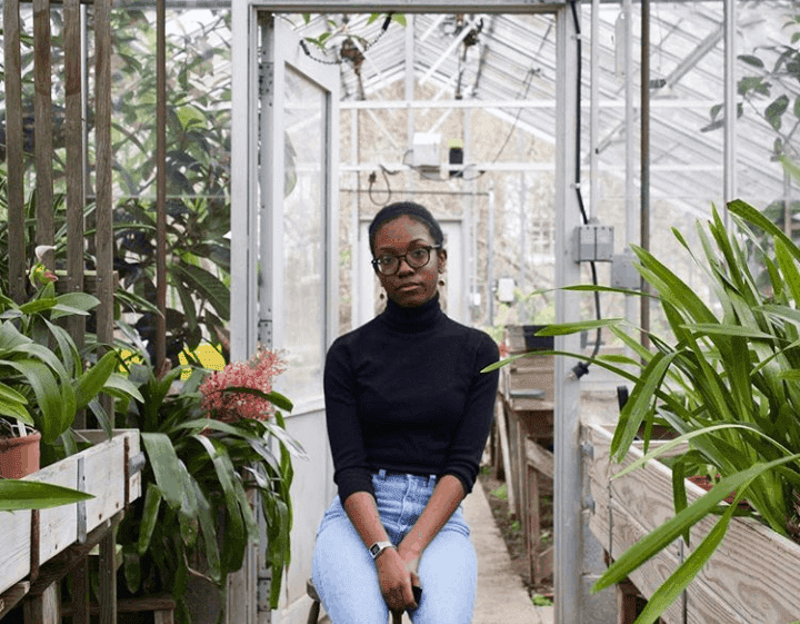 Amaan Stewart poses in Westtown's greenhouse