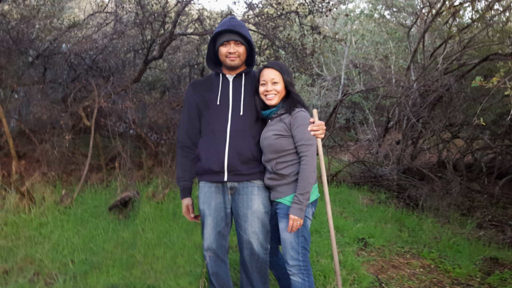 Trinh Mai Thạch and her husband, Hiền Văn Thạch, hike near the coast in Southern California.