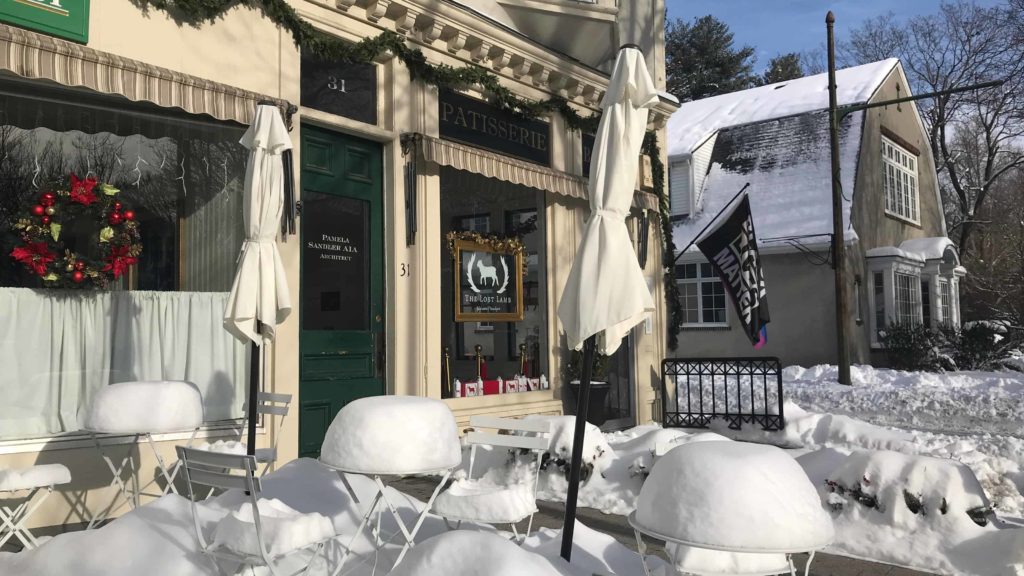 The Lost Lamb bakery and cafe in Stockbridge opens on a bright morning in the snow.