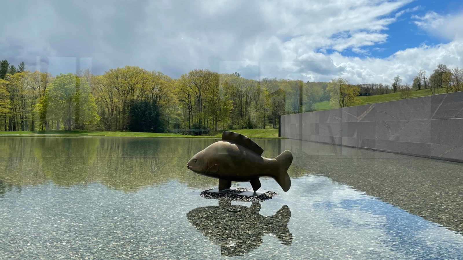 François-Xavier Lalanne's carp hovers over the reflecting pool in Nature Transformed at the Clark Art Institute.