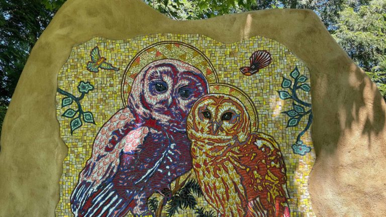 Peter Gerakaris' owl mosaic glimmers in dappled shade at the Berkshire Botanical Garden.