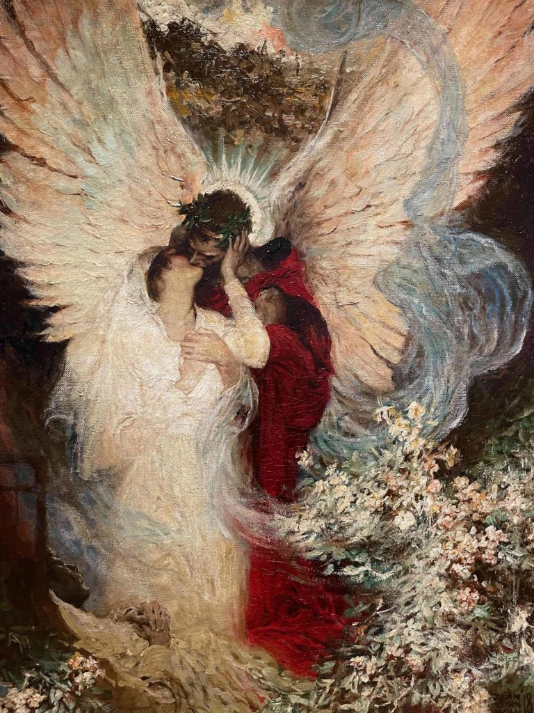 An angel in a red robe holds a woman in his arms in Dean Cornwell's 'The Other Side' in 'Enchanted' at the Norman Rockwell Museum. Press photo courtesy of the museum.