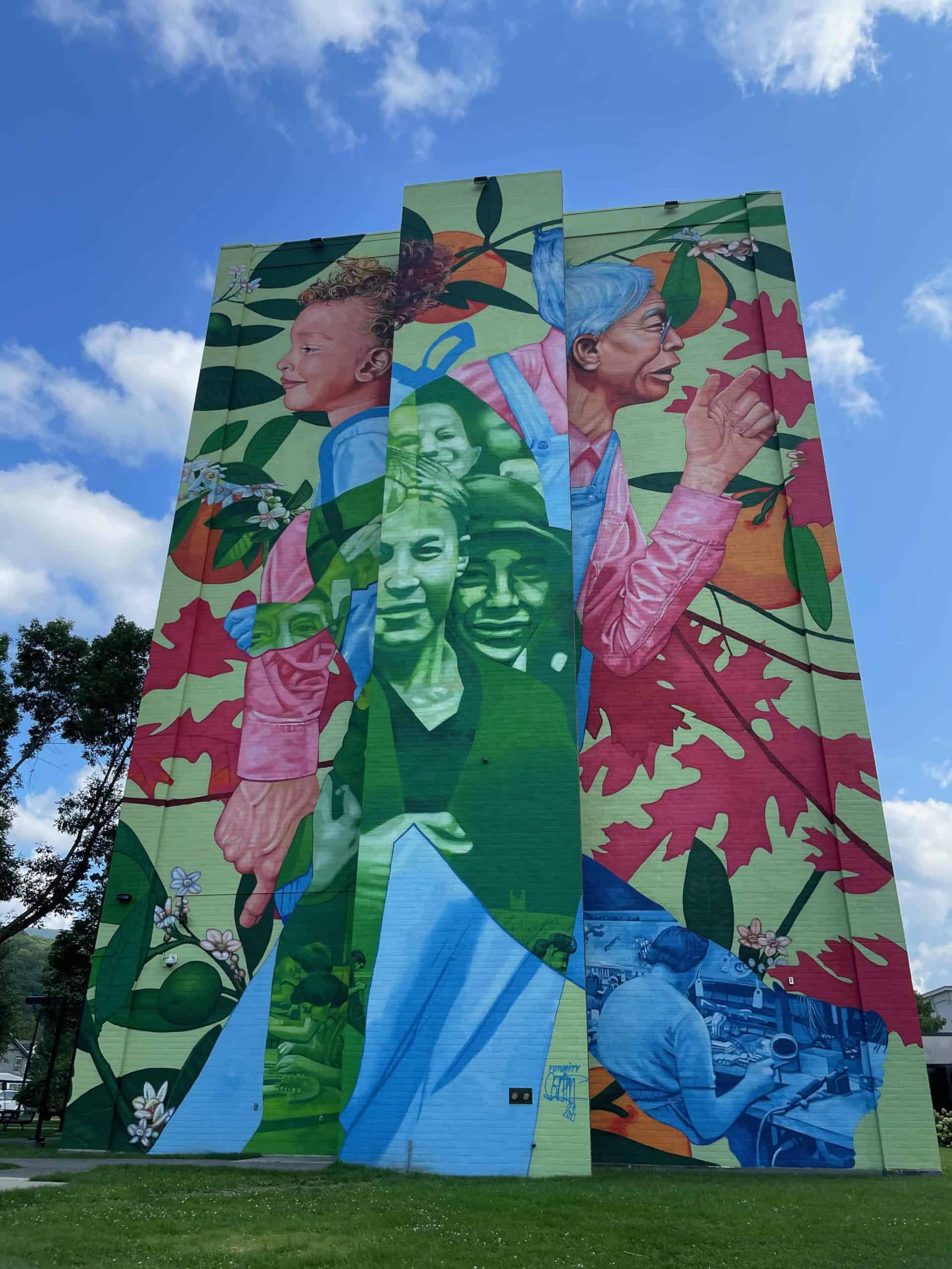 New York artist and muralist Gaia has painted a mural in honor of Lue Gim Gong, horticulturalist and Celestial, who came from China as a young man and worked in the mills in North Adams before moving to Florida.