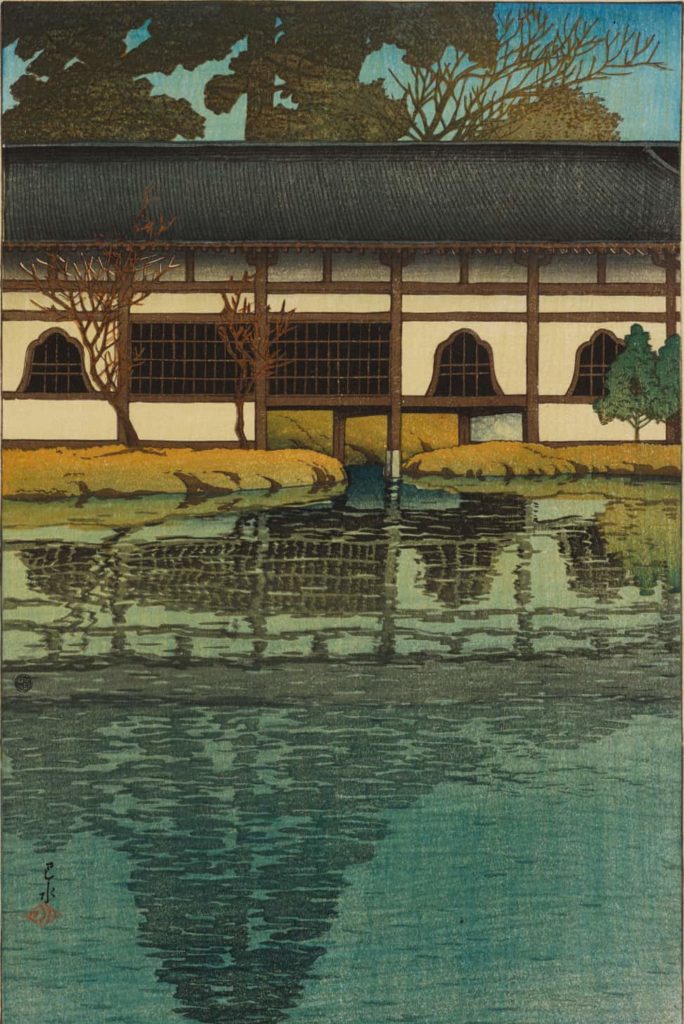 Water shimmers below a long, low, quiet building in Kawase Hasui's Part of the Byōdō-in Temple at Uji 1921. Press image courtesy of the Clark Art Institute