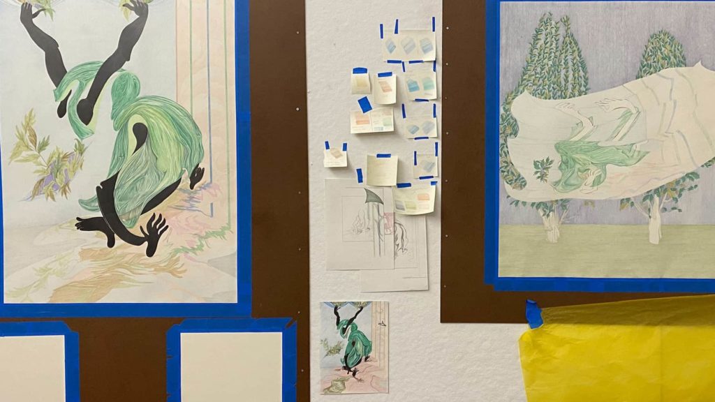 Joshua Ross experiments with drawings in colored pencil in his studio at MCLA's Gallery 51.