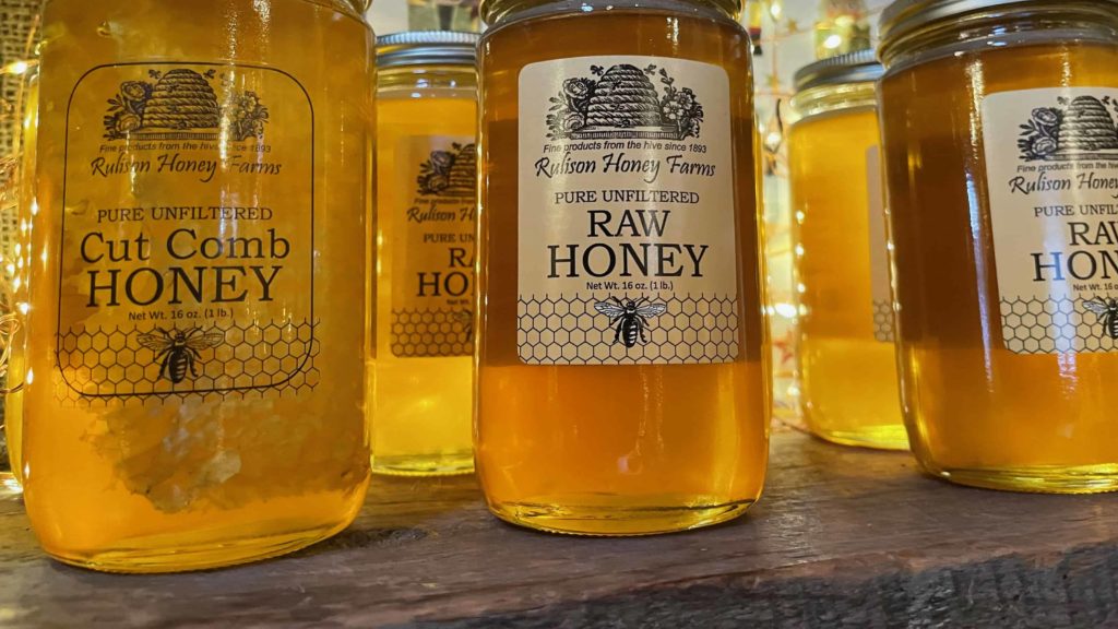 Local jars of honey glow in the winter market at Windy Hill in Stockbridge.