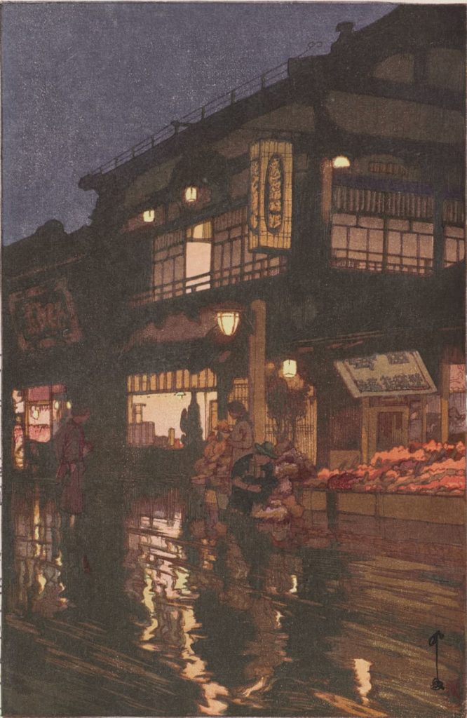 Yoshida Hiroshi's Kagurazaka Street gleams on a wet night in an ukiyo-e woodblock print at the Clark Art Institute.