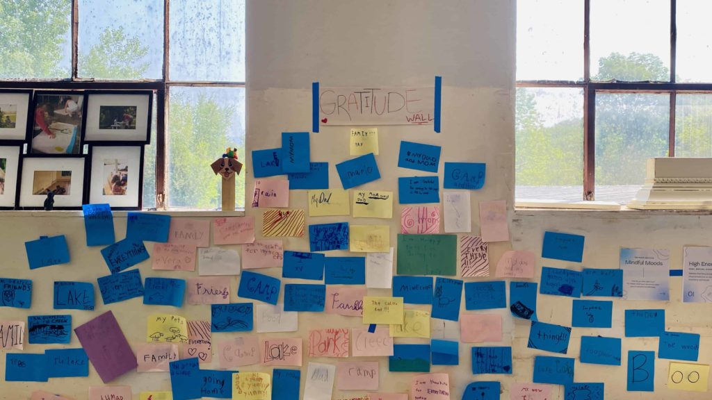 The Sage Street Mill holds a day camp in arts and wellness with a wall of things campers feel thankful for.
