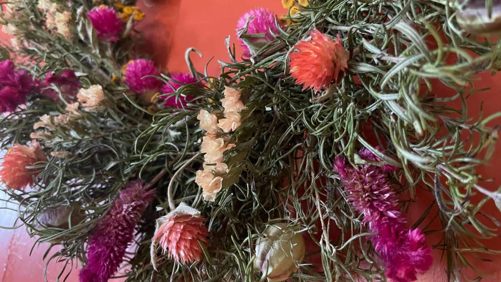 Full Well Farm brings wreathes of rosemary and dried flowers to the North Adams Farmers Market.