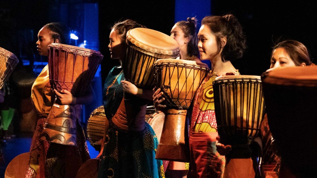 Student percussionists perform on hand drums with Kusika. Press photo courtesy of Williams College.