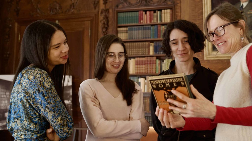 Writers Liana Mack, Yasmine Ameli and Ella Jacobson join Nynke Dorhout in the library at the Mount.