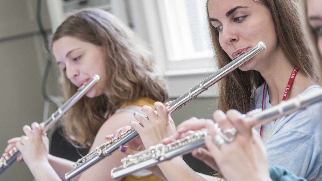 Flutists rehearse with a Boston University Tanglewood Institute winds workshop. Press photo courtesy of BUTI