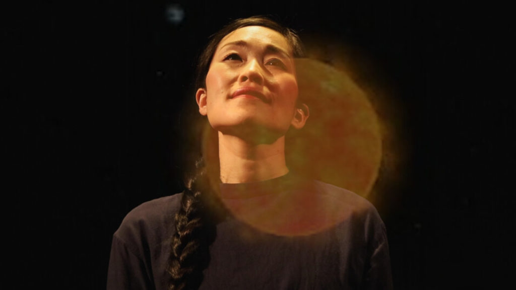Natsuko Hirano performs as astronomer Hisako Koyama in Sunwatcher, a Noh-inspired new play at Ancram Opera House. Press photo courtesy ot the theater