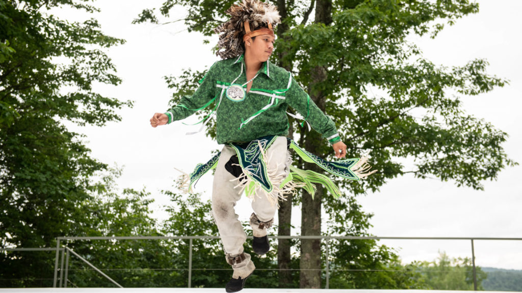 Jake George performs traditional Iroquois dances on the outdoor stage at Jacob's Pillow Dance Festival. Press photo courtesy of the Pillow