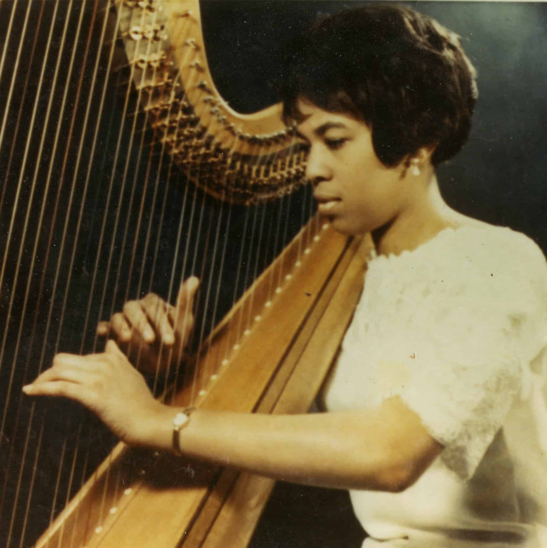 Ann Hobson Pilot performs as harpist with the Boston Symphony Orchestra in the 1970s.