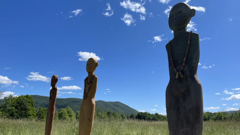 Rose B. Simpson's ceramic sculptures look out from the meadow below the Taconic Crest in Counterculture at Field Farm. Photo by Kate Abbott
