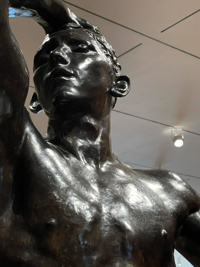A bronze athlete catches the light in Rodin's summer show at the Clark Art Institute.