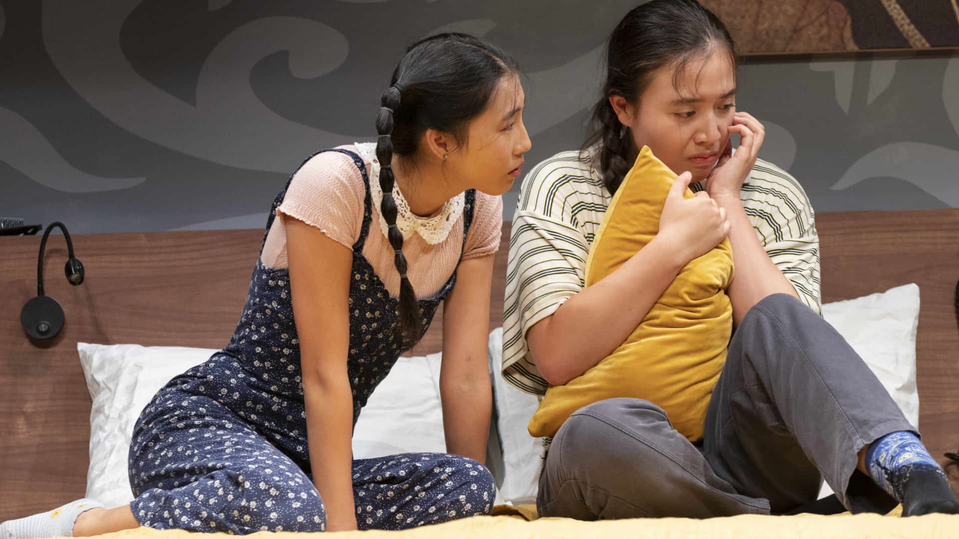 Shirley Chen and Emma Galbraith share a moment of care and sadness in Man of God by Anna Ouyang Moench. Press photo courtesy of Williamstown Theatre Festival