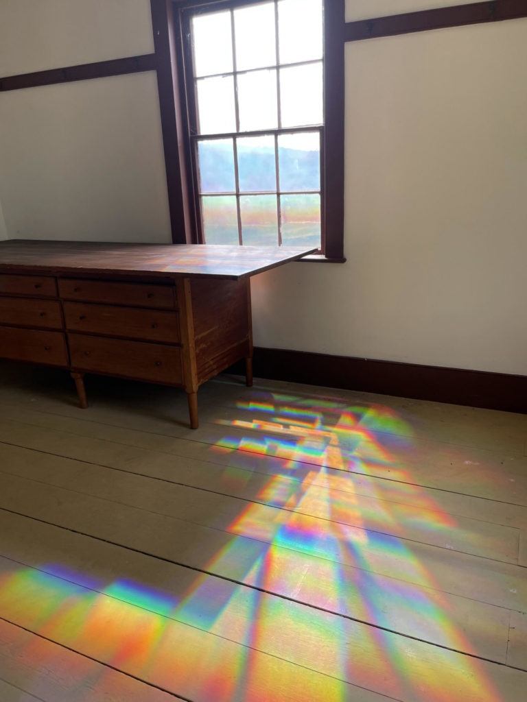 Internationally known Korean artist Kimsooja honors the Shaker sisters with installations in and around the laundry including prisms of light.